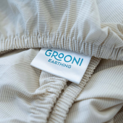 Close-up of the Grooni Grounding Bedsheet fabric, showing its silver thread detail